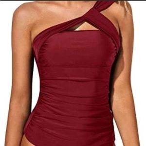 Tankini top deep red. Tempt me sz med.New-No tag Flattering midsection rouching